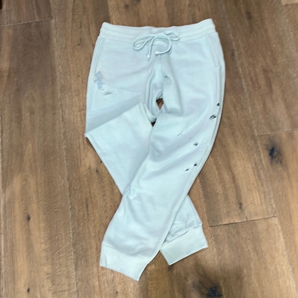 Tyler Jacobs/Feel the Piece small light blue sweats with intentional distressing